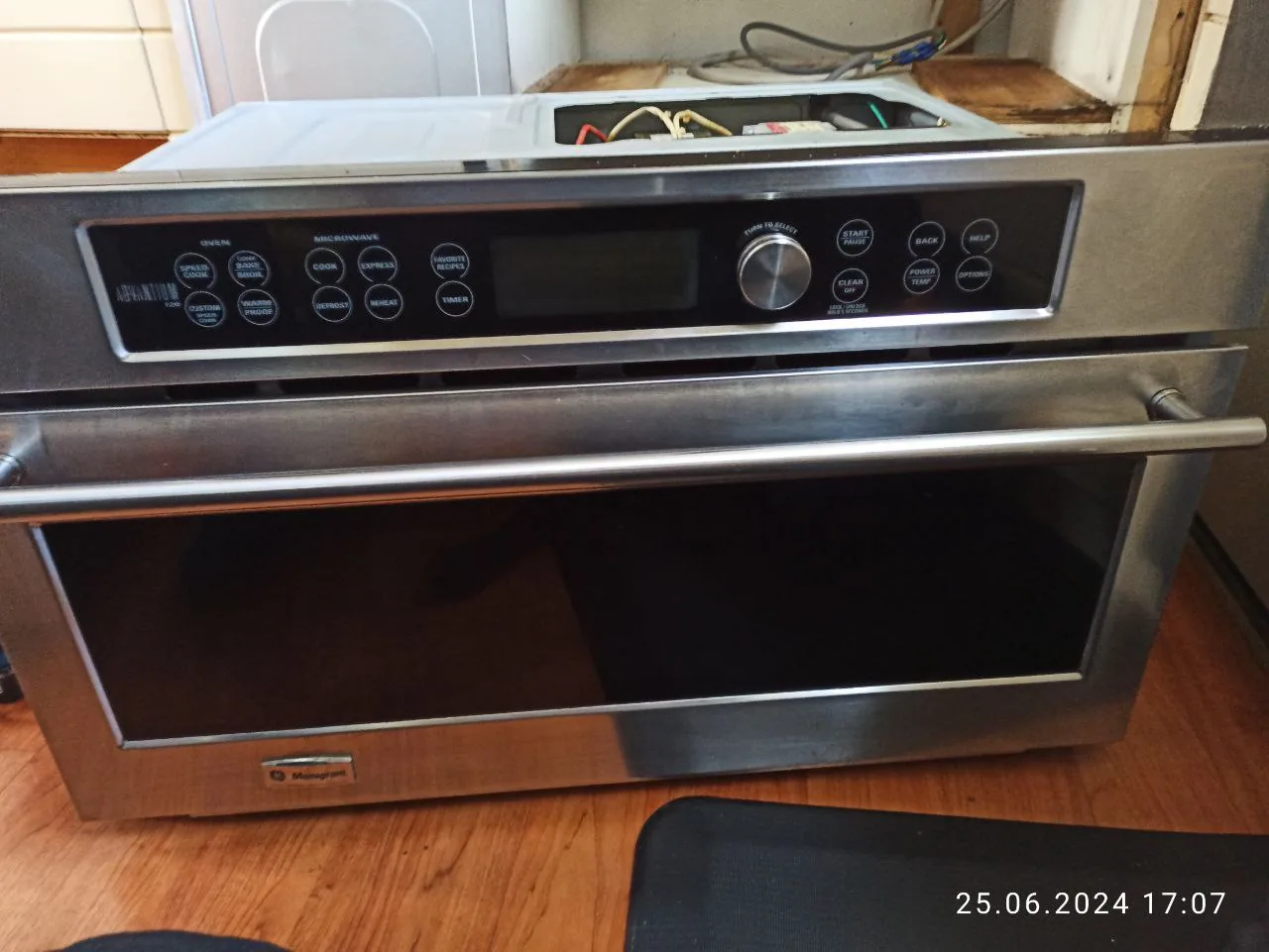 GE Monogram microwave service: a built-in Monogram microwave oven from the front